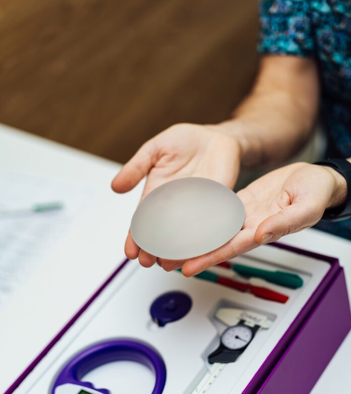 Silicone,Surgery,Implant,In,Woman,Hands.,Beauty,Breast,Surgery,Impplants.